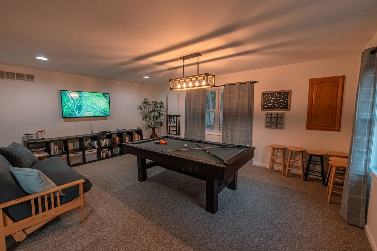 Four Seasons Retreat | Pocono Vacation Rental | Game room with something for everyone: pool, ping-pong, board games, Wii, poker & more!}