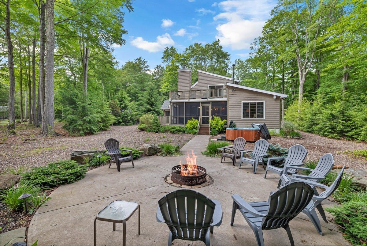 The Lake Jawn | Pocono Vacation Rental | A perfect space to entertain guests and make memories by the fire}