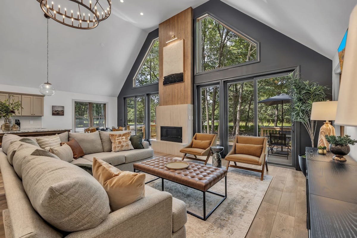 Penn Forest Lodge | Pocono Vacation Rental | An Instagram-worthy living area with ample seating and natural light that will make you feel right at home.}